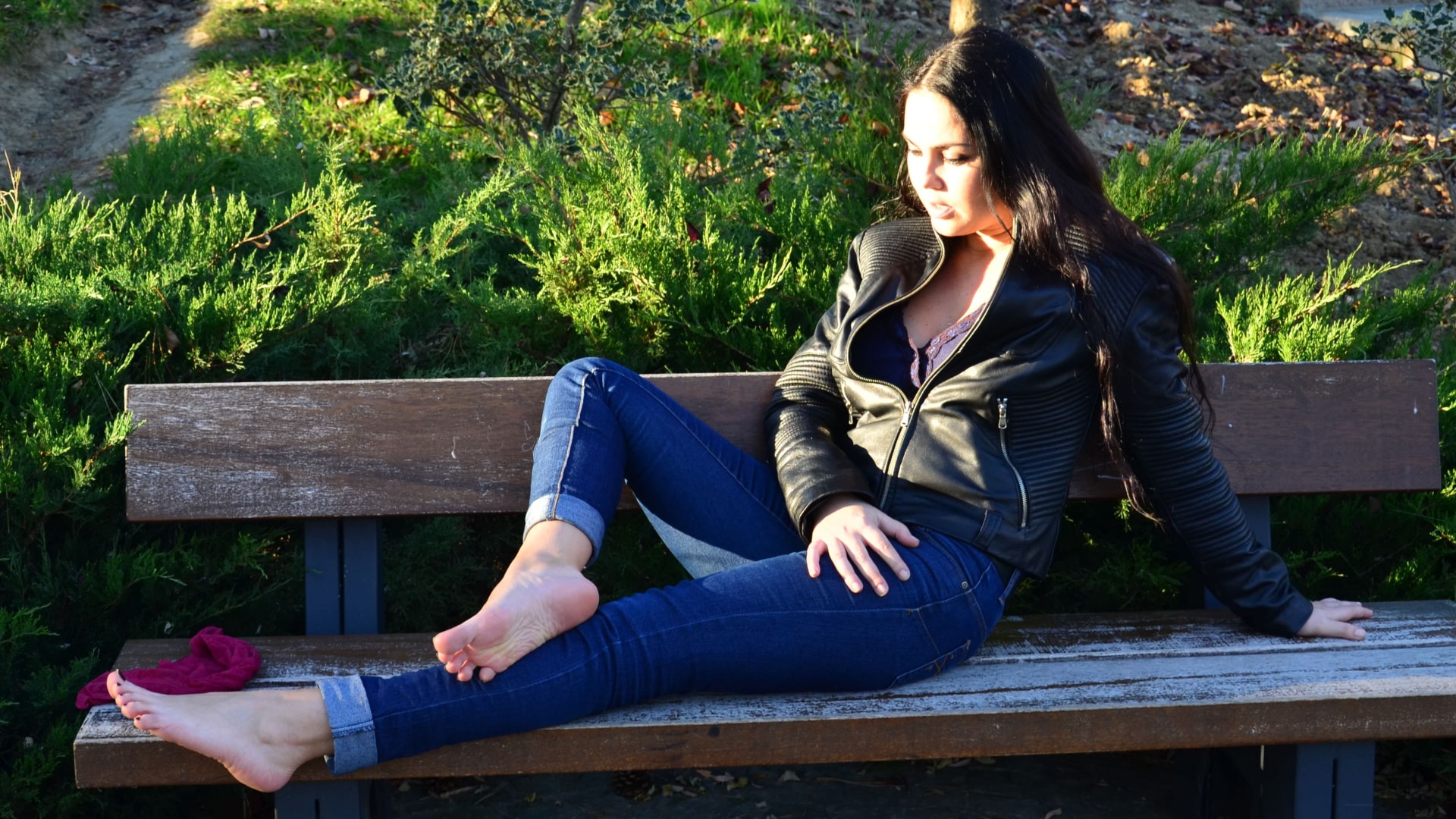 Flirty Diana teasing you with her sexy feet in the park